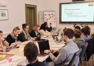Participants taking notes during the Erasmus+ KA2 Project Implementation training on lump-sum funding